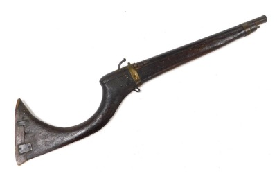 A 19thC Middle Eastern matchlock short musket, with brass furnishings and ramrod, 78cm long overall.