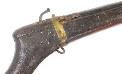 A 19thC Middle Eastern matchlock short musket, with brass furnishings and ramrod, 78cm long overall. - 2