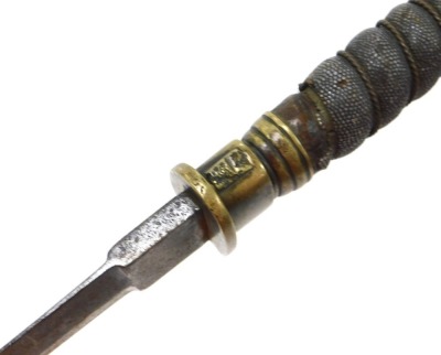 An early 19thC short sword, possibly Scottish, with double edged blade, brass hilt, shagreen bound grip, the brass pommel with rudimentary thistle engraving, length of blade 55cm, lacking scabbard. - 3