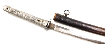 A WWII period Katana sword, probably a Chinese copy, the blade measuring 58cm, with plain chrome plated pierced tsuba, with cast white metal handle, and leather bound scabbard.