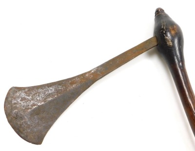 An African tribal war axe, possible a Chokwe, with steel blade 29cm, and natural tapered wooden shaft with turned terminal and iron banded grip, 57cm. - 2