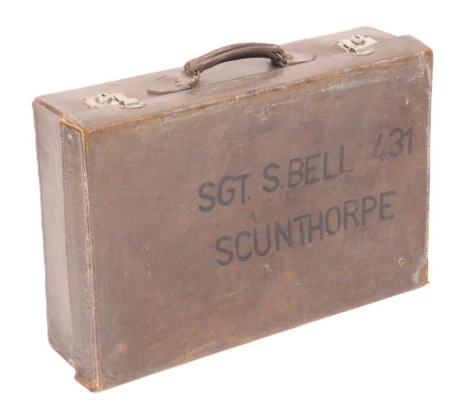 A vintage leather suitcase, with personalised details for Sgt S Bell 431, Scunthorpe.