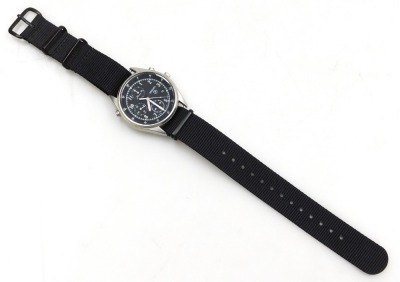 A Seiko British military chronograph watch, in stainless steel case with black dial, three subsidiary hands and date, with luminous Arabic numerals and hands, the case back numbered 6645-99 8149181 with broad arrow above 2790/95, serial number 530403, and - 2