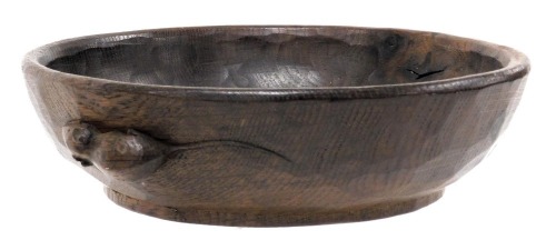 A Robert Thompson of Kilburn 'Mouseman' oak fruit bowl, carved to the side with a mouse, 24cm wide.