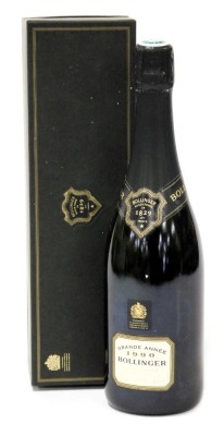 A bottle of Bollinger champagne 1990, Grande Année, 75cl, boxed.