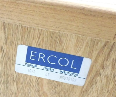 An Ercol light elm sideboard, with three central drawers, flanked by two cupboard doors, raised on a plinth base, 68cm high, 155cm wide, 43.5cm deep. - 2