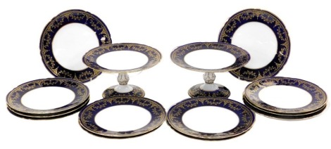 An early 20thC Copeland Spode porcelain dessert service, gilt decorated with swags of ivy, on a cobalt blue ground, printed marks, comprising pair of tazze and twelve plates.