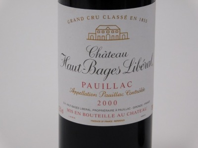 Two bottles of Chataue Poujeaux Moulis-en-Medoc 2005, together with a bottle of Chateau Haut-Bages Libéral Pauillac 2000, Grande Cru Classe en 1855. (3) - 3