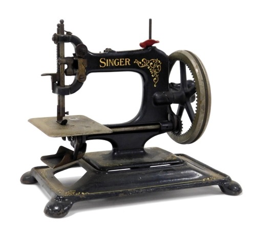 A late 19thC Singer sewing machine, 29cm wide.