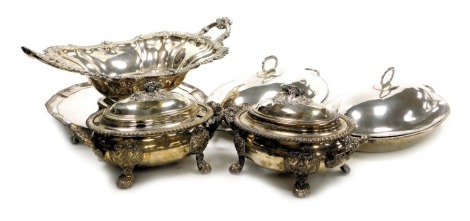 A group of 19thC silver plated wares, including a salver, with crest and monogram engraving, a pair of sauce tureens and covers, pair of entrée dishes and covers and a twin handled basket.