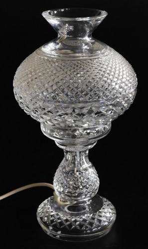 A Waterford crystal table lamp, with a crystal shade, etched mark, 35cm high. Buyer Note: WARNING! This lot contains untested or unsafe electrical items. It is supplied for scrap or reconditioning only. TRADE ONLY