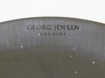 A Georg Jensen stainless steel bottle stopper, with a rubber bung, printed mark, 5.5cm high. - 2