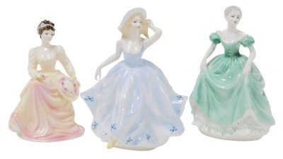 Three Coalport porcelain figures, comprising Lady in Lace, Ladies of Fashion, Henrietta, and Debbie. (AF)