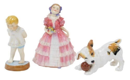 A Royal Doulton figure modelled as Ruby HN1724, Royal Worcester figure modelled as Tommy 2913, and Royal Doulton of a terrier playing with a ball HN1103. (3)