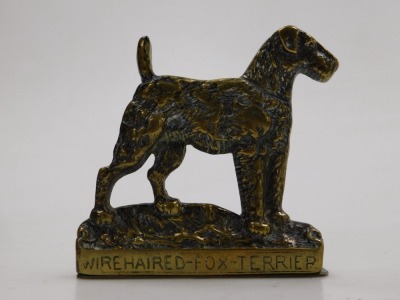 A pair of early 20thC brass bookends, cast as wire haired fox terriers, 12cm wide. - 2