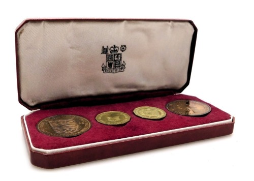 A Royal Mint 1964 Jersey proof coin collection, comprising two 3d and two pennies, cased.