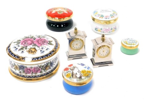 A Crummles English enamels box, decorated with cats, boxed, further box Happy Birthday, two Falcon china porcelain boxes, Wedgwood Christmas 1988 enamel box and two Hilton Tokyo Bay miniature carriage clocks. (7)