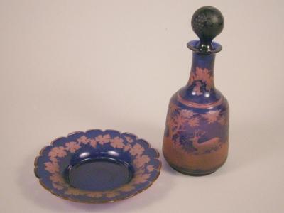 A Bohemian blue and pink flash decanter stopper and stand