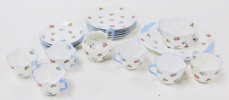 A Shelley porcelain Rose, Pansy and Forget-Me-Not part tea service, Dainty shape, comprising bread plate, cream jug, sugar bowl, six tea cups, saucers and plates.