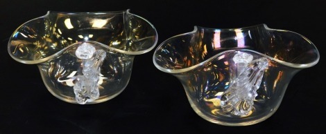 A pair of late 19thC glass triform bowls, with leaf and floral form handles, possibly James Powell & Sons, 14cm wide.