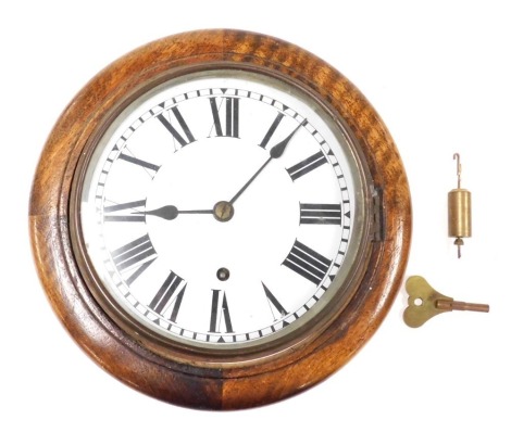 A 19thC and later circular mahogany cased wall clock, dial bearing Roman numerals, thirty hour German movement, with key, 27cm diameter.