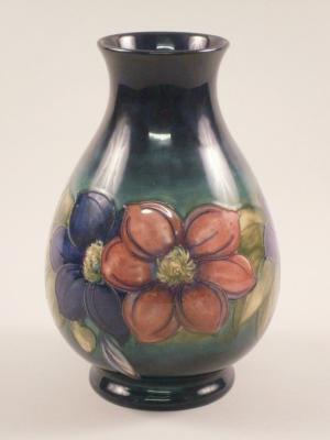 A Moorcroft clematis pattern baluster shaped vase