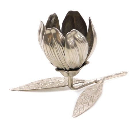 A late 20thC silver plated ashtray, formed as a flower, on a branch and leaf stem, with detachable petals, to serve as ashtrays, 22.5cm wide.