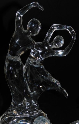 A group of Swarovski crystal animals, including a hedgehog, elephant, and a kangaroo, a grand piano, candle holder, vase of flowers, etc., together with RCR glass figure group of a pair of dancers. (a quantity) - 4