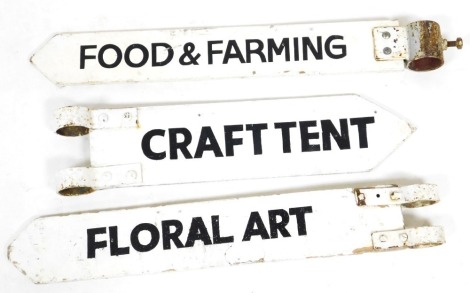 Three vintage white painted fair signs, for "Floral Art", "Food & Farming", and "Craft Tent", two 67cm wide, the other 57cm wide.