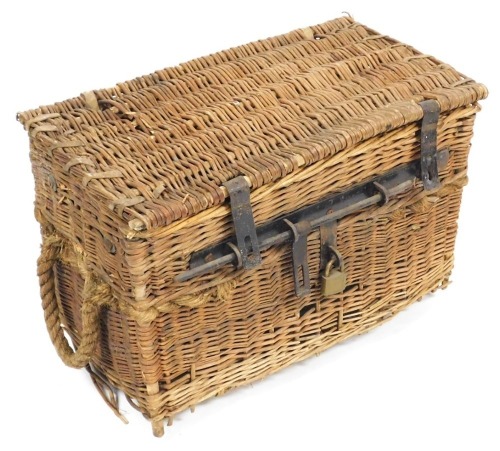 An early 20thC wicker travelling cool box, with lead liner, and cast iron locking mechanism, 44cm high, 65cm wide.