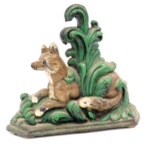 A painted cast iron doorstop, modelled as a fox within grass, 30cm high.