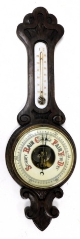 A Victorian oak barometer, with thermometer, within a carved case, 80cm high.