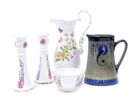 An Aynsley porcelain Cottage Garden pattern jug, of baluster form, pair of Rennie Mackintosh porcelain candlesticks, and sugar bowl, and a Royal Doulton Titanian pottery jug. (5)