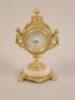 A 19thC French gilt metal timepiece