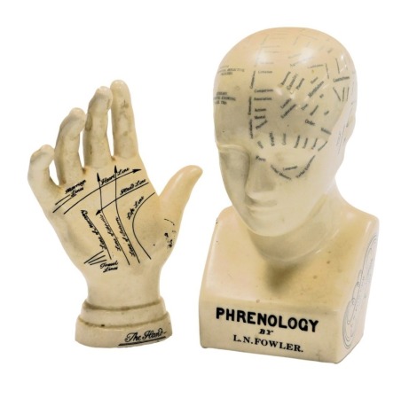 A pottery Phrenology head, after a model by LN Fowler, 24cm high, together with a pottery model of the hand, 21cm high. (2)