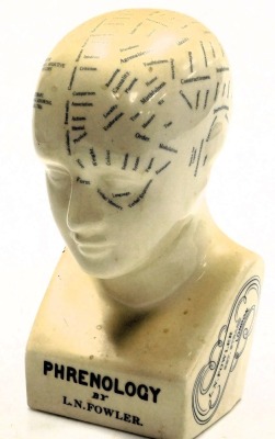 A pottery Phrenology head, after a model by LN Fowler, 24cm high, together with a pottery model of the hand, 21cm high. (2) - 2