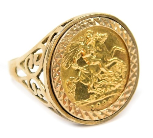 An Elizabeth II gold half sovereign 1982, in a 9ct gold ring mount, size V, 7.3g.