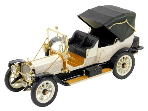 A Franklin Mint diecast model of a 1912 Packard Victoria, with details of the engine compartment and driving compartment layouts, boxed, with certificate.