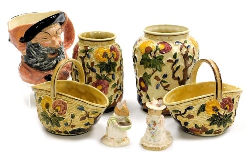 A Royal Doulton pottery character jug modelled as Falstaff D6287, two Brambly Hedge figures modelled as Mrs Toadflax, and Poppy Eye Bright, a pair of HJ Wood Indian Tree pattern baskets, and two vases. (7)