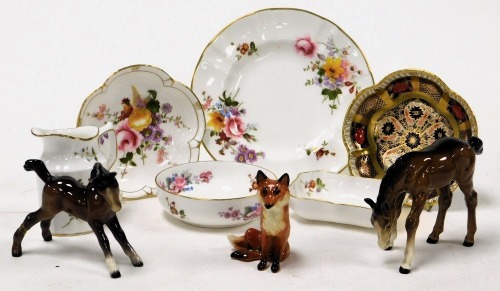 A Royal Crown Derby Old Imari dish, another in the Derby Posies pattern, together with a cream jug, tea plate and two further dishes, a Beswick pottery figure of a fox, and two brown glass fowls. (9)