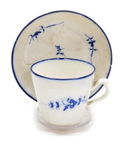 A late 18thC Caughley porcelain coffee cup and saucer, of bucket form, decorated in the Chantilly Sprigs pattern, blue Salopian mark.