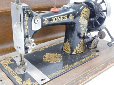 A Jones Family C.S sewing machine, serial number B581596, wooden cased. - 2