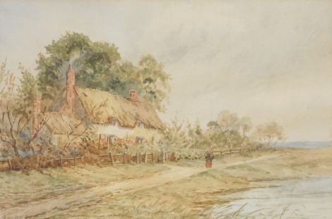 RW McKrae. Landscape with thatched cottage and figure in a lane, watercolour, signed, 20.5cm x 30.5cm.