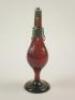 A 19thC Bohemian ruby glass holy water sprinkler with Middle Eastern white metal mounts