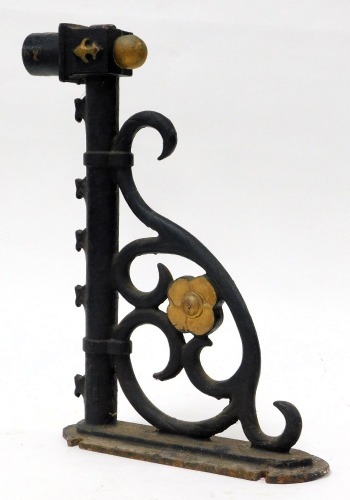 A Victorian cast iron and gilt painted wall bracket, 51cm wide.