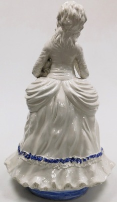 A Capodimonte figure of a girl, standing in Victorian costume with a basket of flowers and a rose, printed mark, 69cm high. - 2