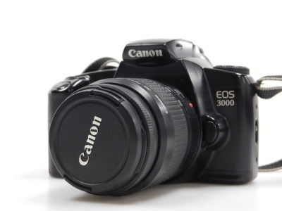 A Canon EOS 3000 camera, and a Canon Auto Focus Sprint camera, with camera bag. - 2