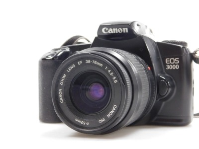 A Canon EOS 3000 camera, and a Canon Auto Focus Sprint camera, with camera bag. - 3