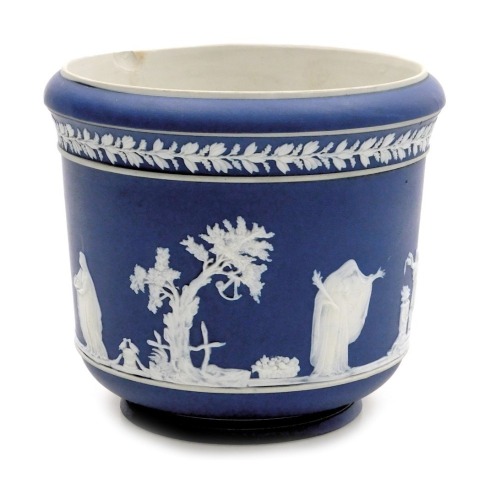 An Adams dark blue Jasperware jardiniere, sprig moulded with a band of classical figures, impressed marks, 20cm high.