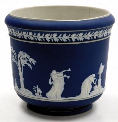 An Adams dark blue Jasperware jardiniere, sprig moulded with a band of classical figures, impressed marks, 20cm high. - 2